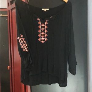 Loose, pheasant type, black blouse, never worn.
